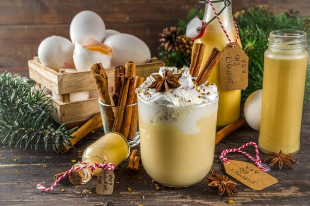 Christmas bombardino cocktail with egg liqueur Premium Photo